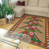 Brown wool rug with colorful boho flowers 142x196cm
