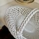 Oval basket in white glazed earthenware