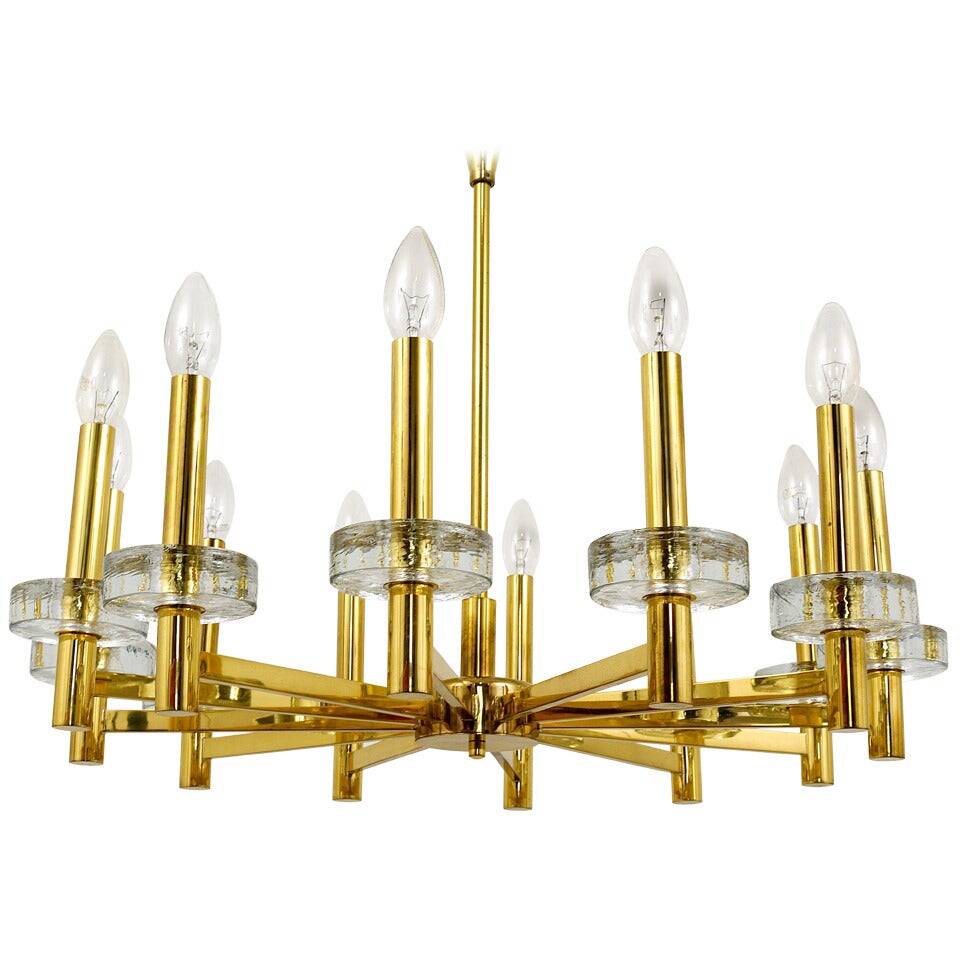Brass and glass disc pendant light in the style of Gaetano Sciolari, mid-century, Italy, 1970s.