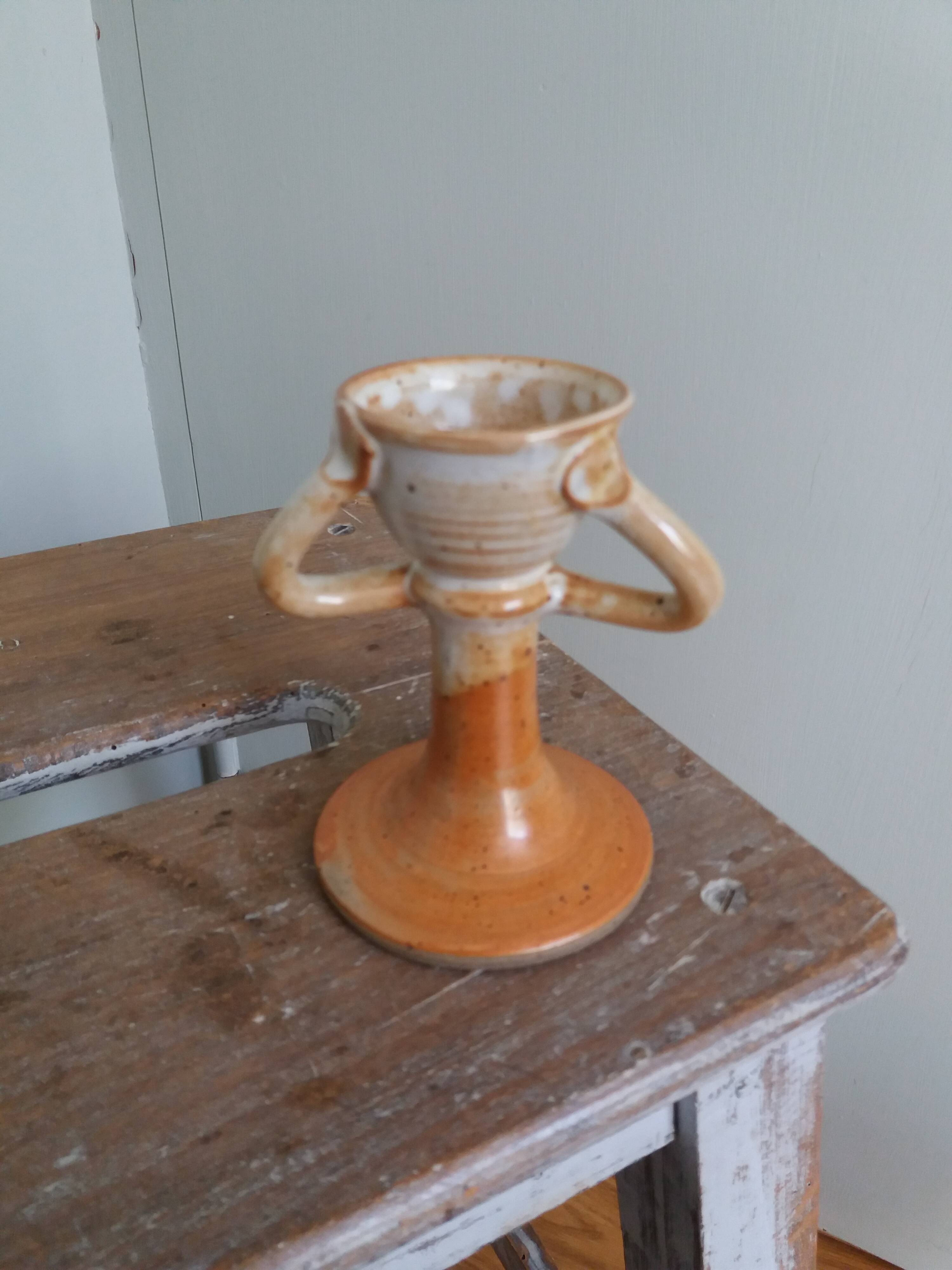 Anthropomorphic sandstone egg cup signed GL