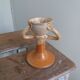 Anthropomorphic sandstone egg cup signed GL