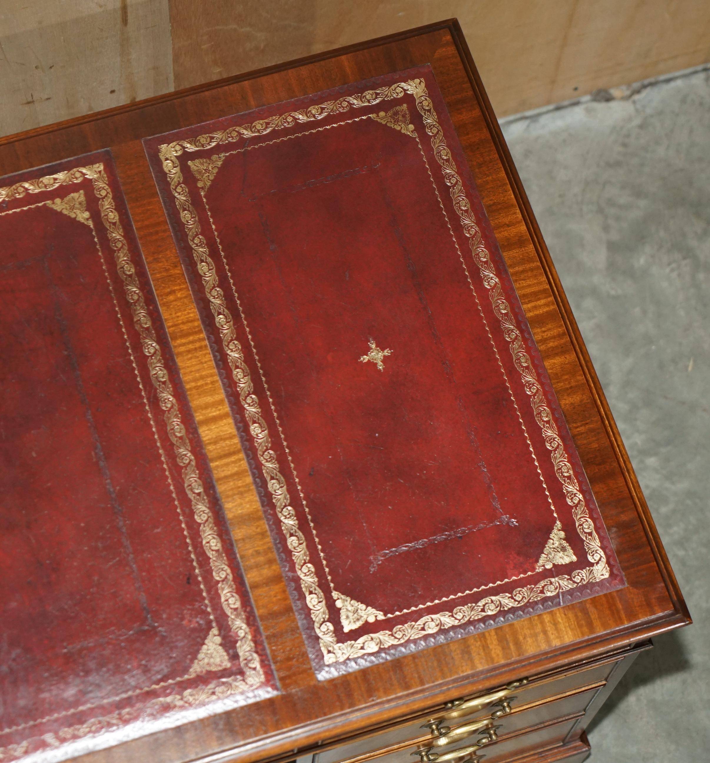 Partner desk Bevan Funnell in hardwood with leather top and gold leaf gilding.