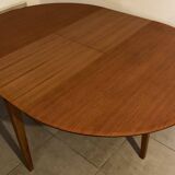 Scandinavian round teak dining table from the 60s extendable