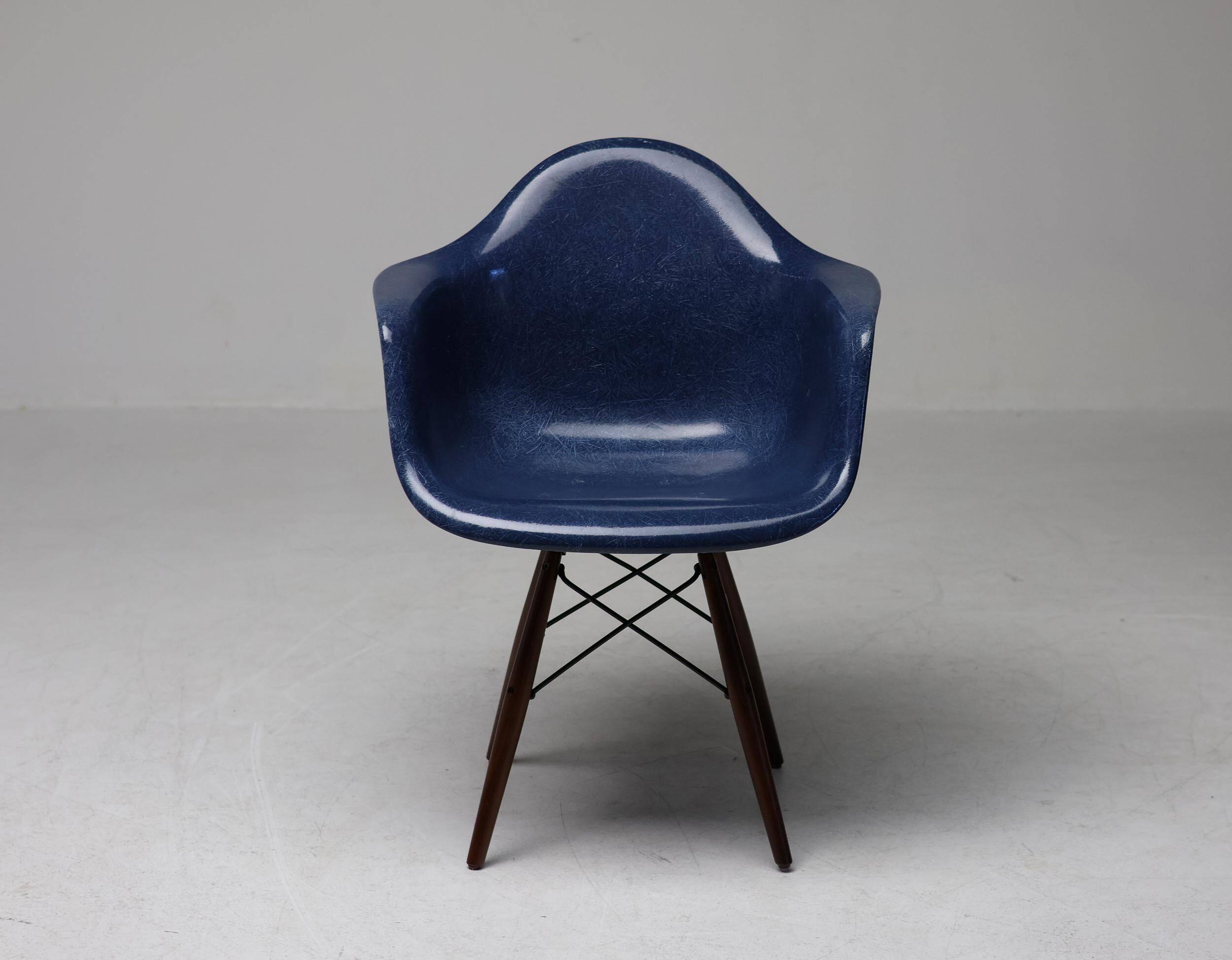 Indigo blue Charles Eames "PAW" armchair by Herman Miller, mid-century modern.