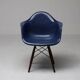 Indigo blue Charles Eames "PAW" armchair by Herman Miller, mid-century modern.