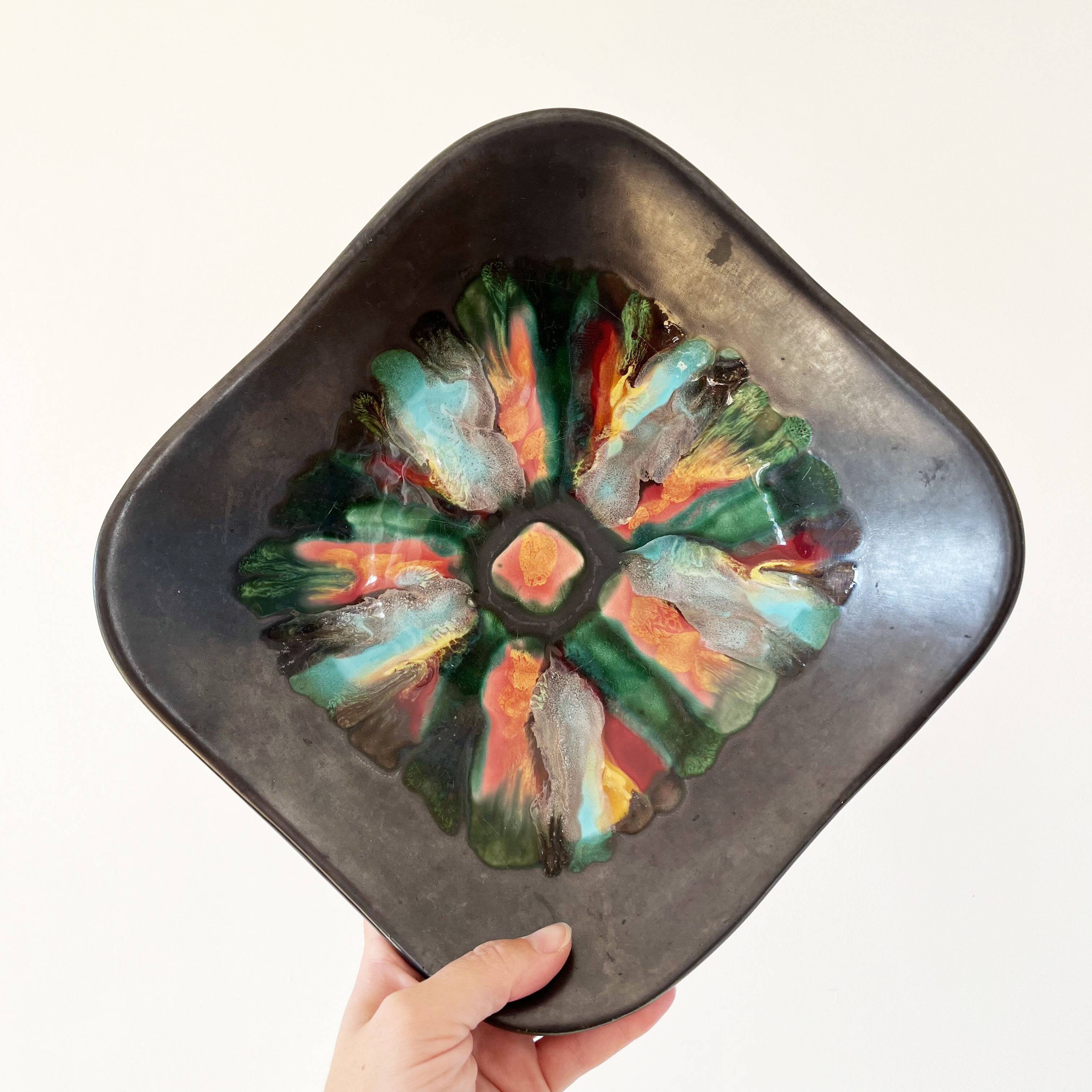 Matte and iridescent black ceramic dish 1960