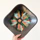 Matte and iridescent black ceramic dish 1960