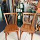 Pair of vintage Baumann bistro chairs in wood.