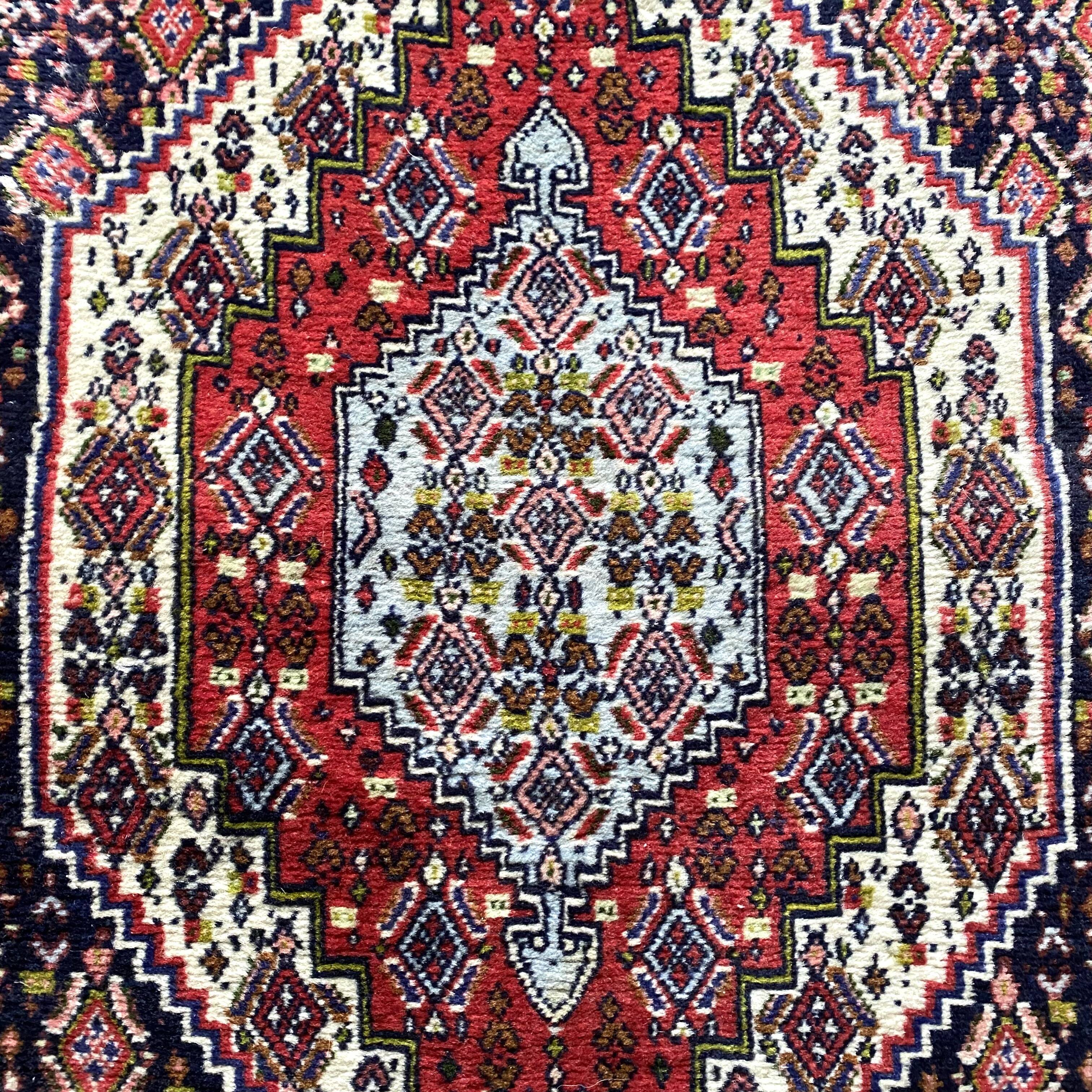 Persian wool carpet 69x113