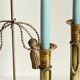 Trio of vintage knotted candlesticks brass