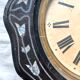 Horloge ancienne œil de bœuf bois et nacre