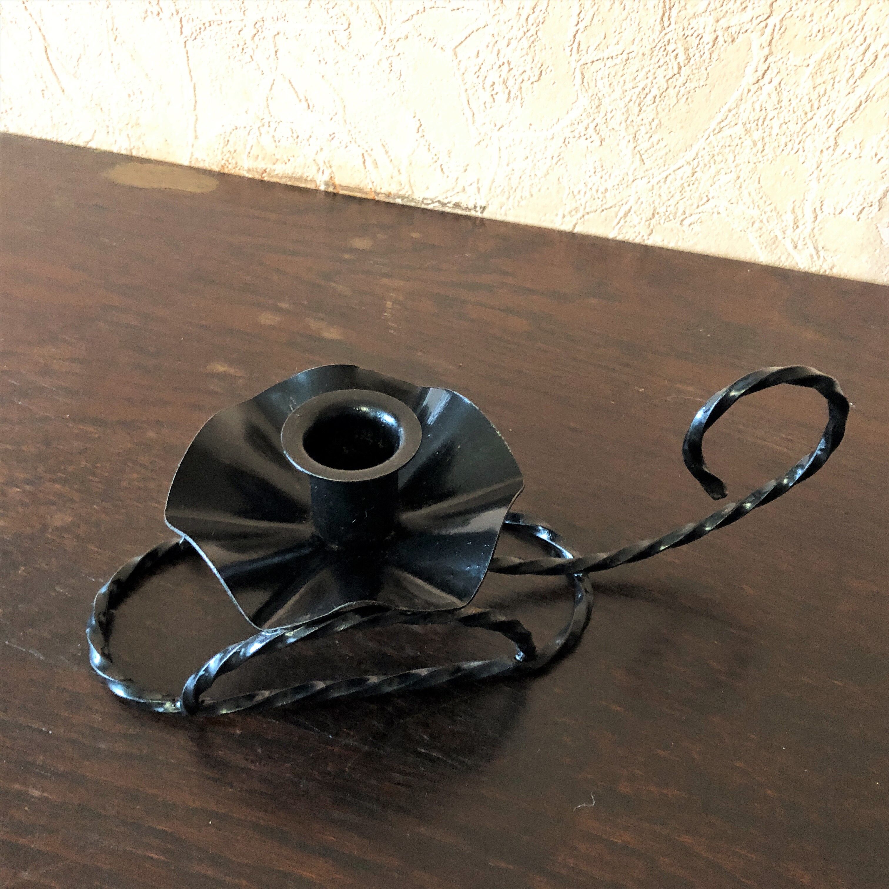 Handmade hand candle holder in vintage black wrought iron