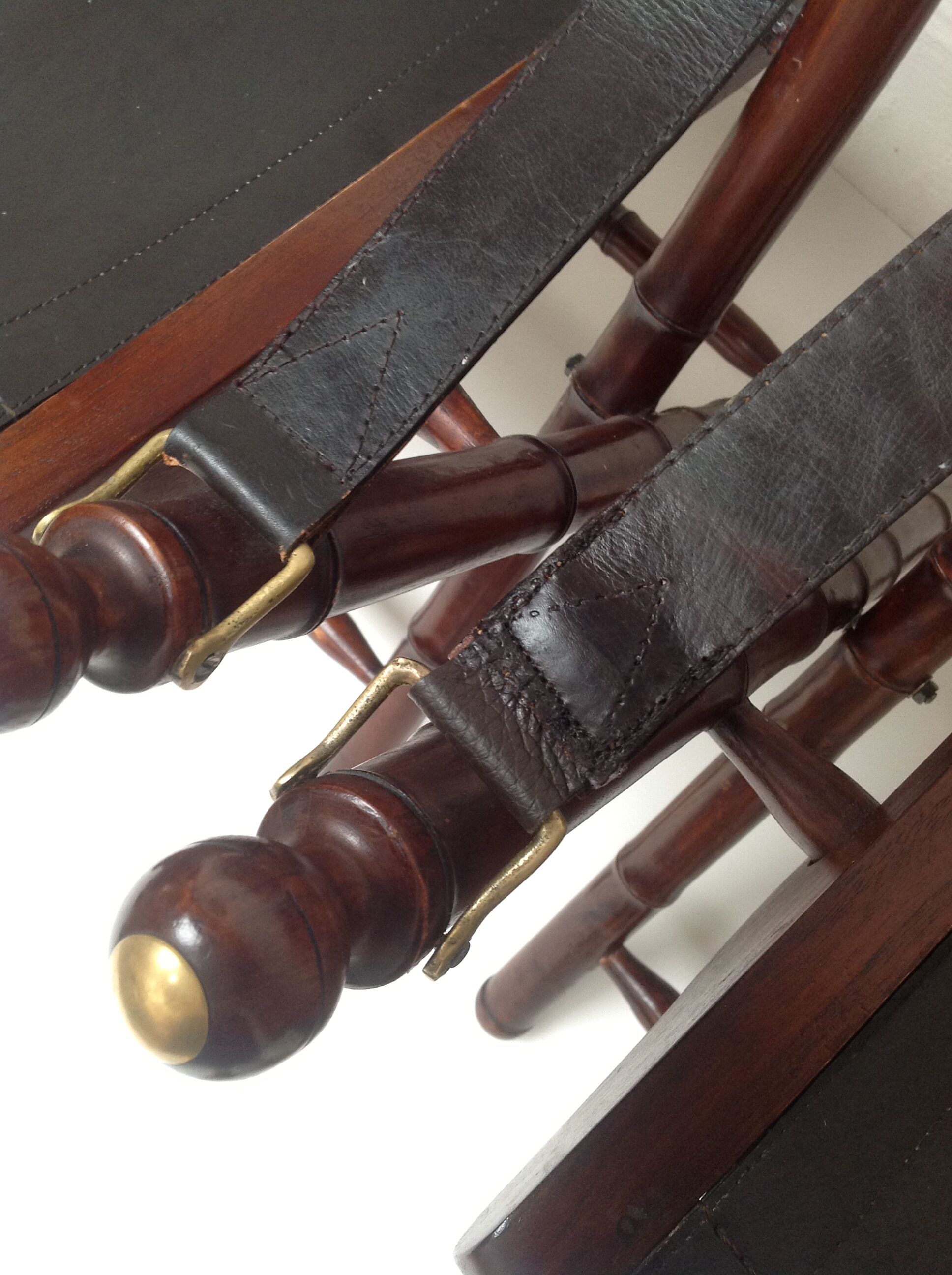 Pair of vintage "safari" folding armchairs in mahogany and leather