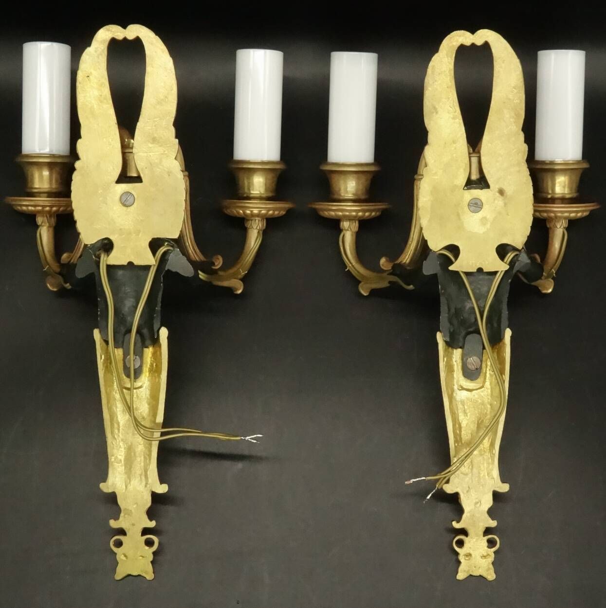 Pair of winged putti wall sconces in Louis XVI style - gilded bronze and black patina