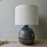 Blue enamelled sandstone lamp, signed