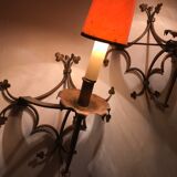Pair of gilded metal sconces decorated with clovers.