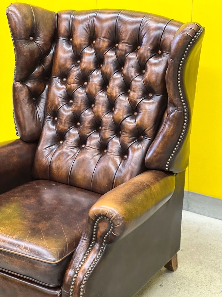 Brown vintage handmade chesterfield recliner armchair