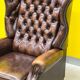 Brown vintage handmade chesterfield recliner armchair