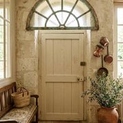 Old wrought iron full riveted gates from the 19th century.
