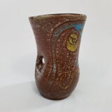 Accolay décor of face ceramic vase