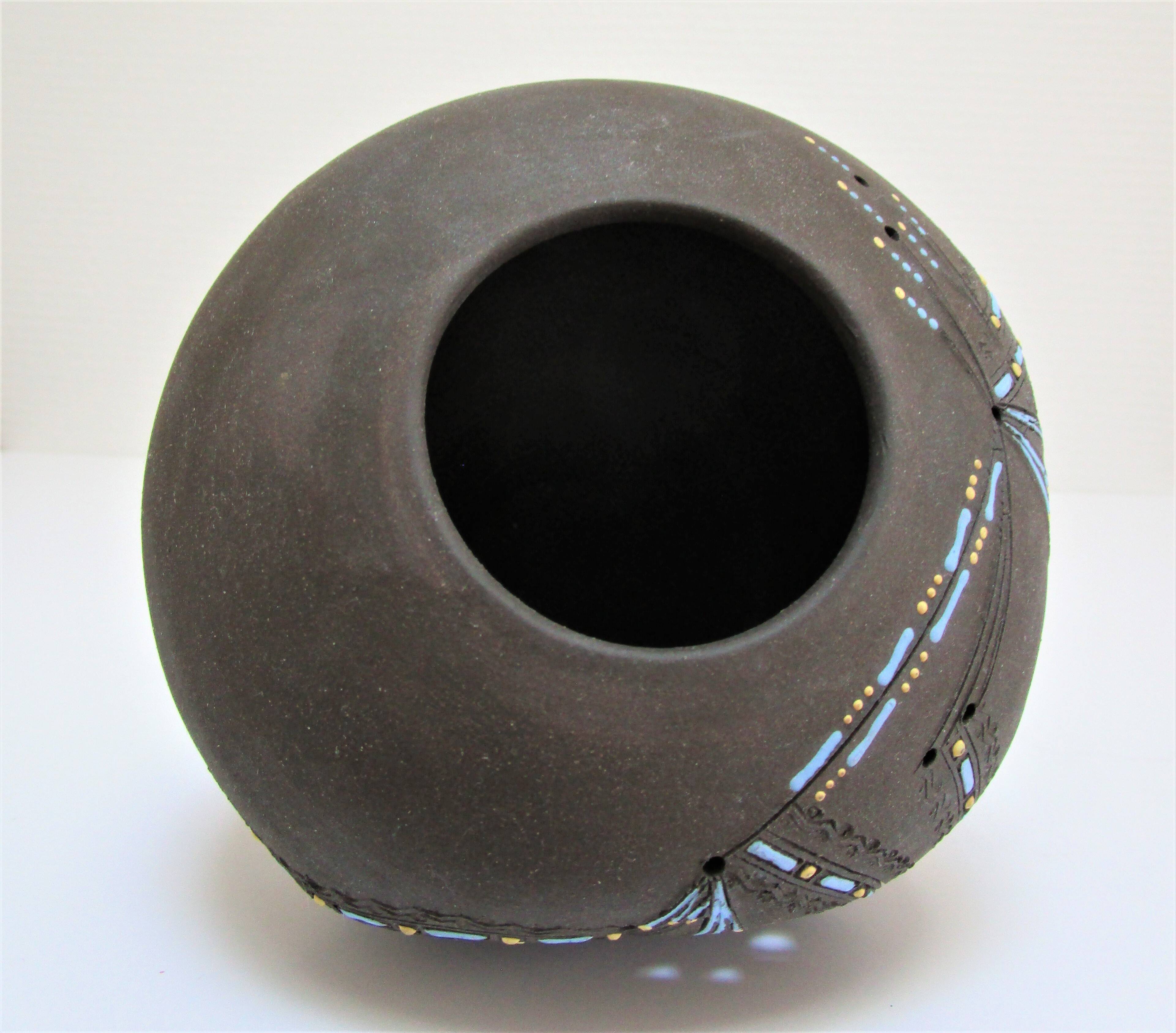 Anthropomorphic candle holder, scarified ceramic, stamped design