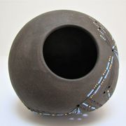 Anthropomorphic candle holder, scarified ceramic, stamped design