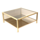 Large vintage Hollywood Regency coffee table made of brass and smoked glass from the 1970s