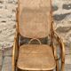 Rocking-chair vintage en rotin canné