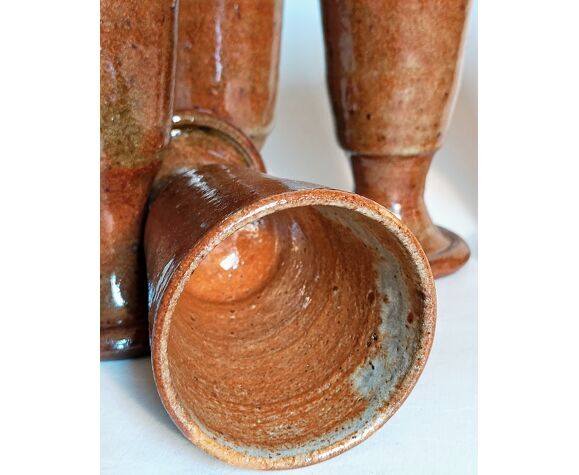 Five ancient potter's mazagrans in enamelled sandstone