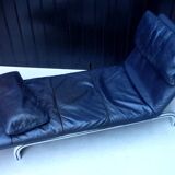 XDark brown leather chaise longue
