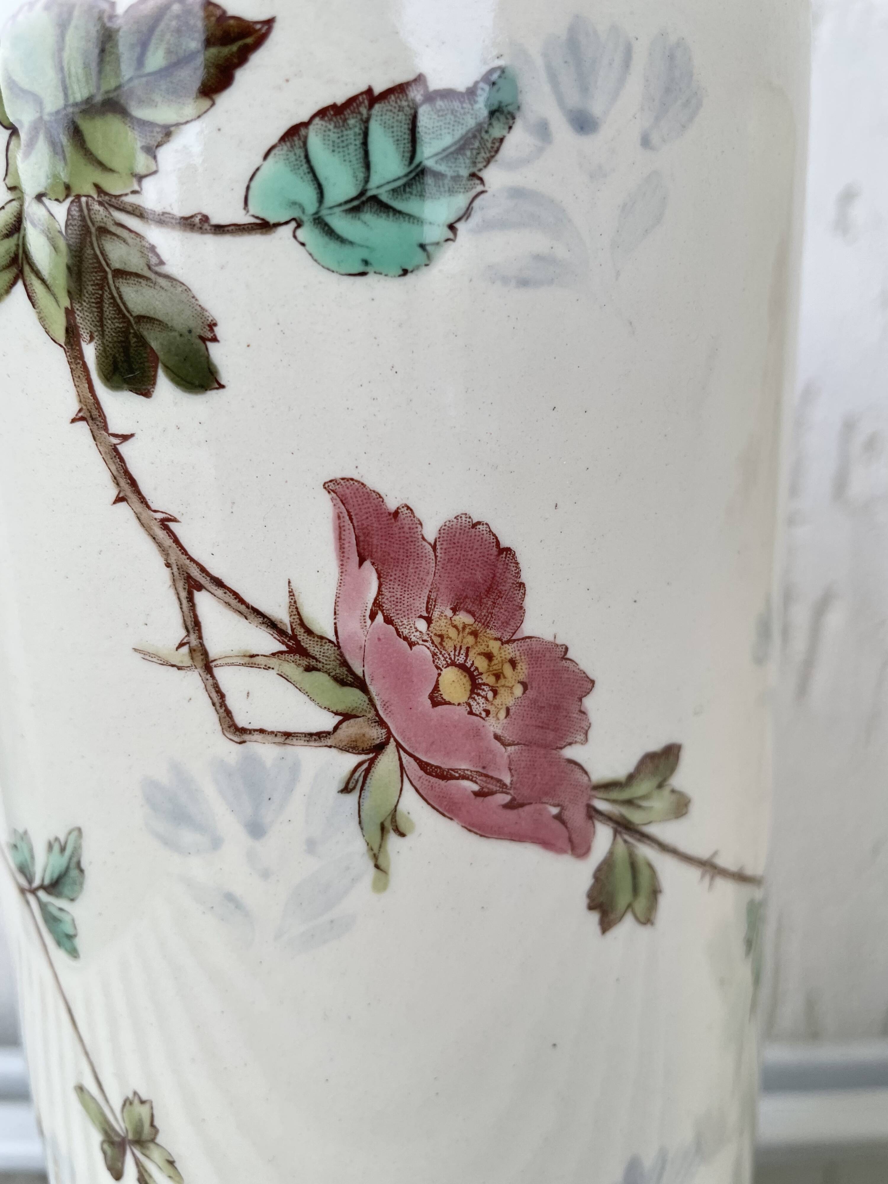 Roller vases in earthenware with floral decoration of wild rose, circa 1930–1950.