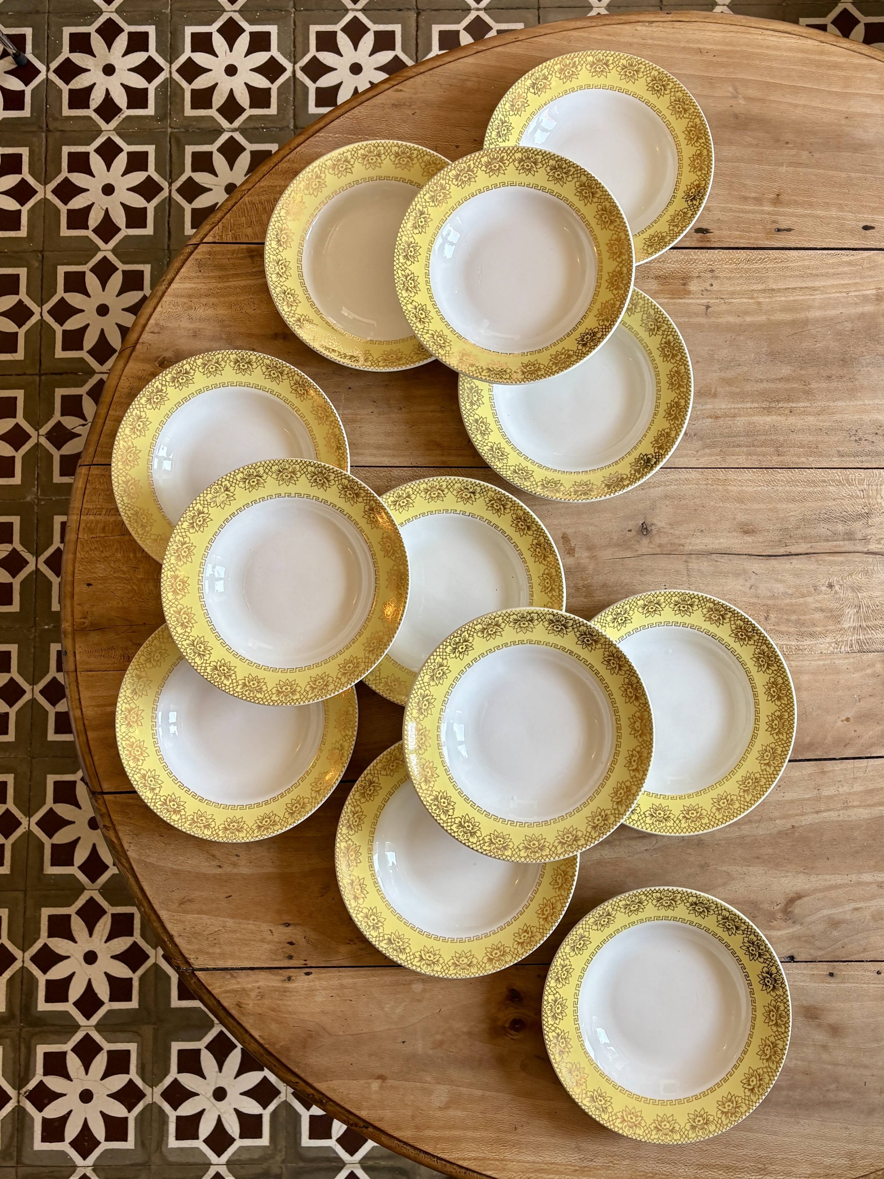 Set of 12 vintage yellow, white and gold soup plates