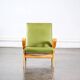 Fauteuil en skaï vert
