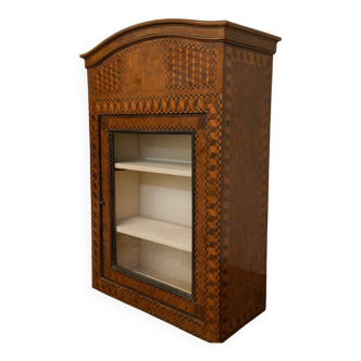 Antique Louis XV display cabinet with geometric marquetry decoration.