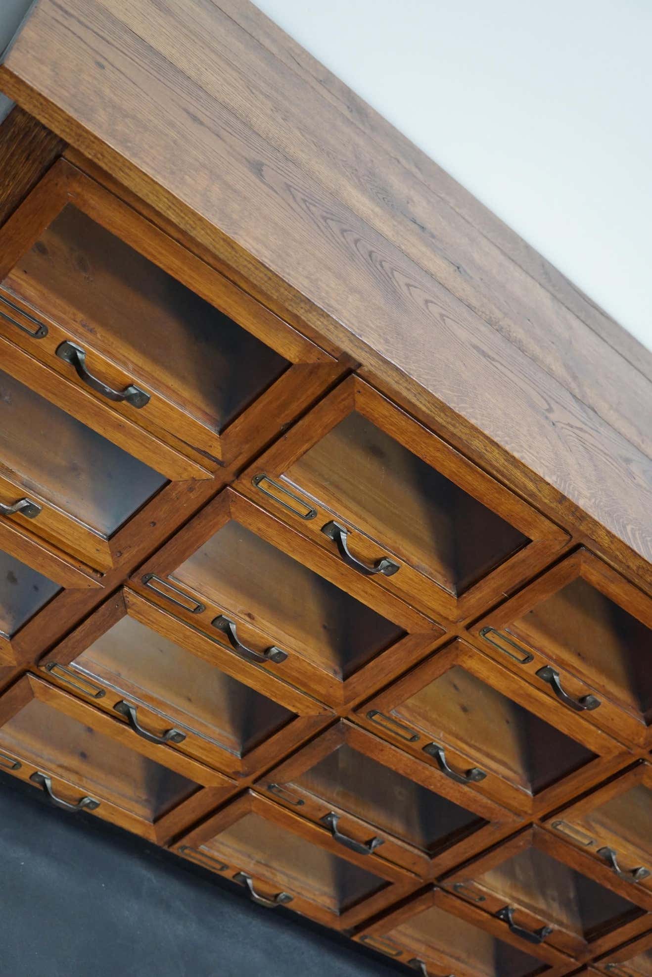 Vintage dutch oak haberdashery cabinet 1930s