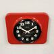 Vintage red bakelite wall clock from prim, 1970s