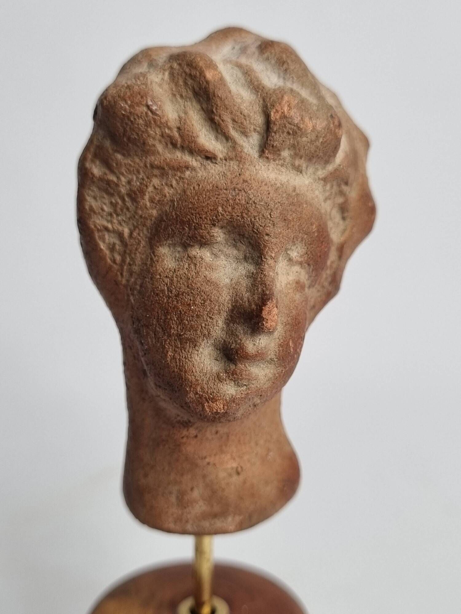 Female head in terracotta, Tanagra – Antique fragment – 4th–2nd century 14.5 cm