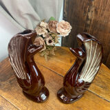 Pair of ceramic vases in the shape of swans.