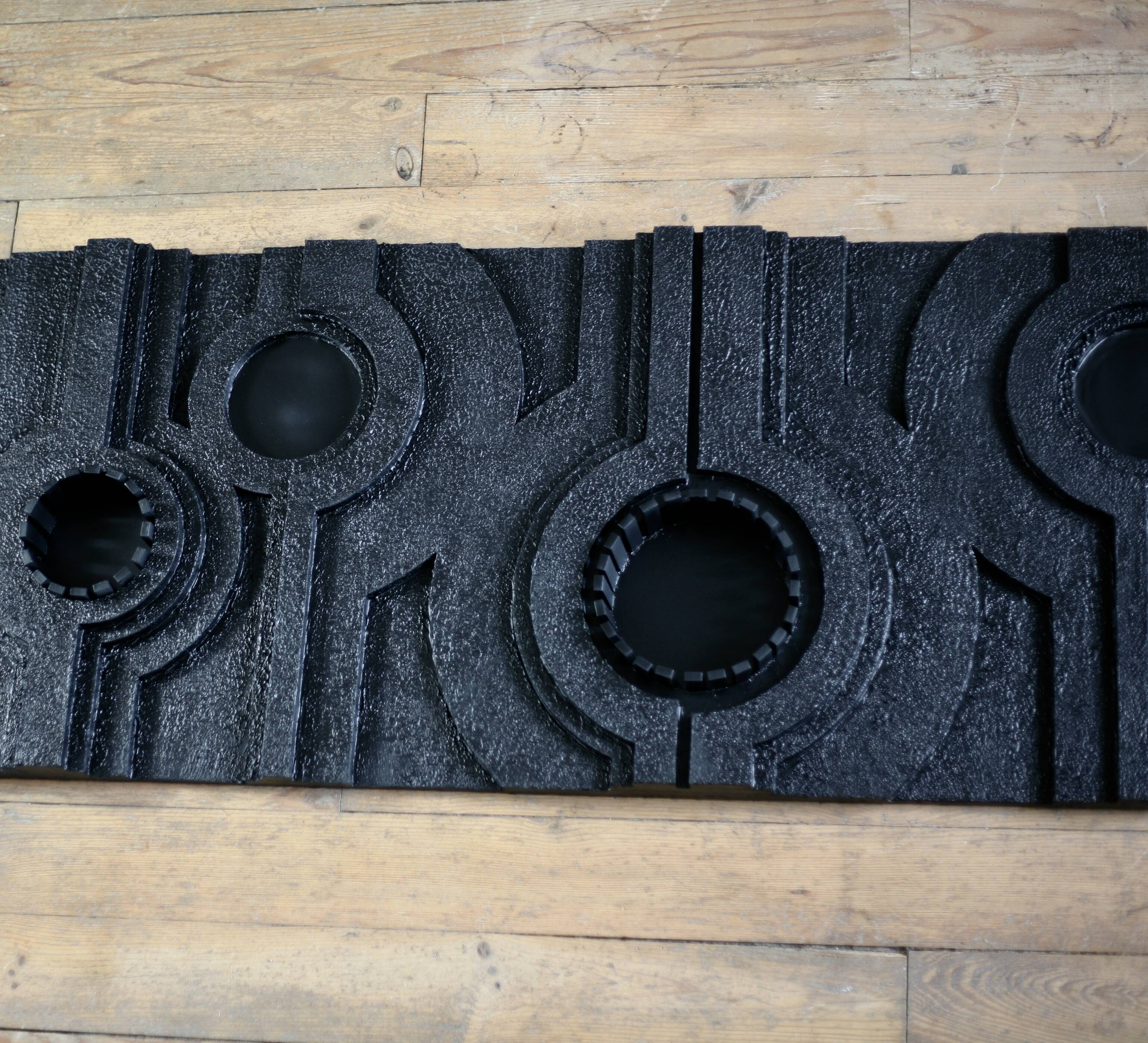 Wall sculpture, wood and black coating, late 1970s