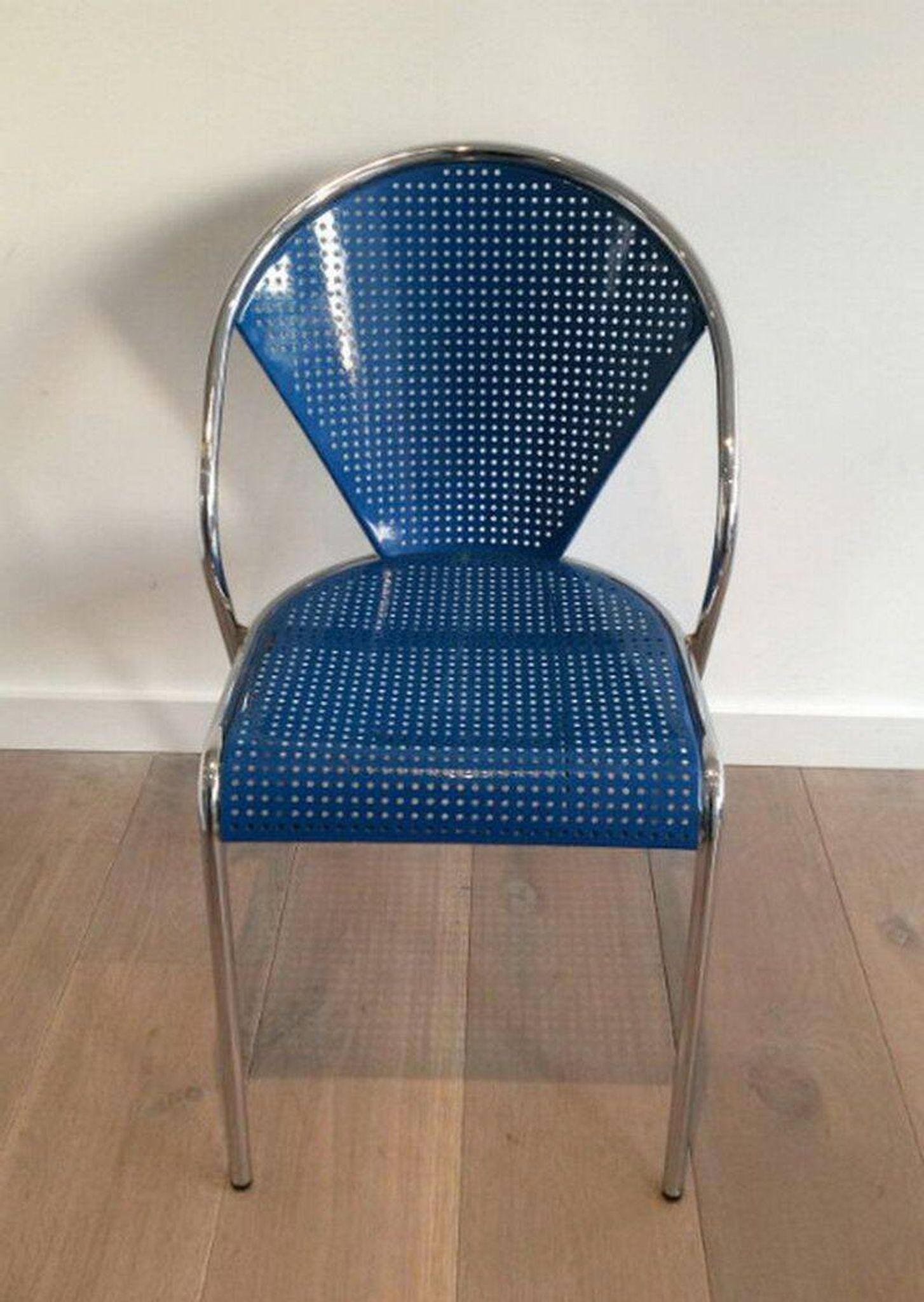 Set of 4 chrome chairs with perforated seats in blue lacquered metal