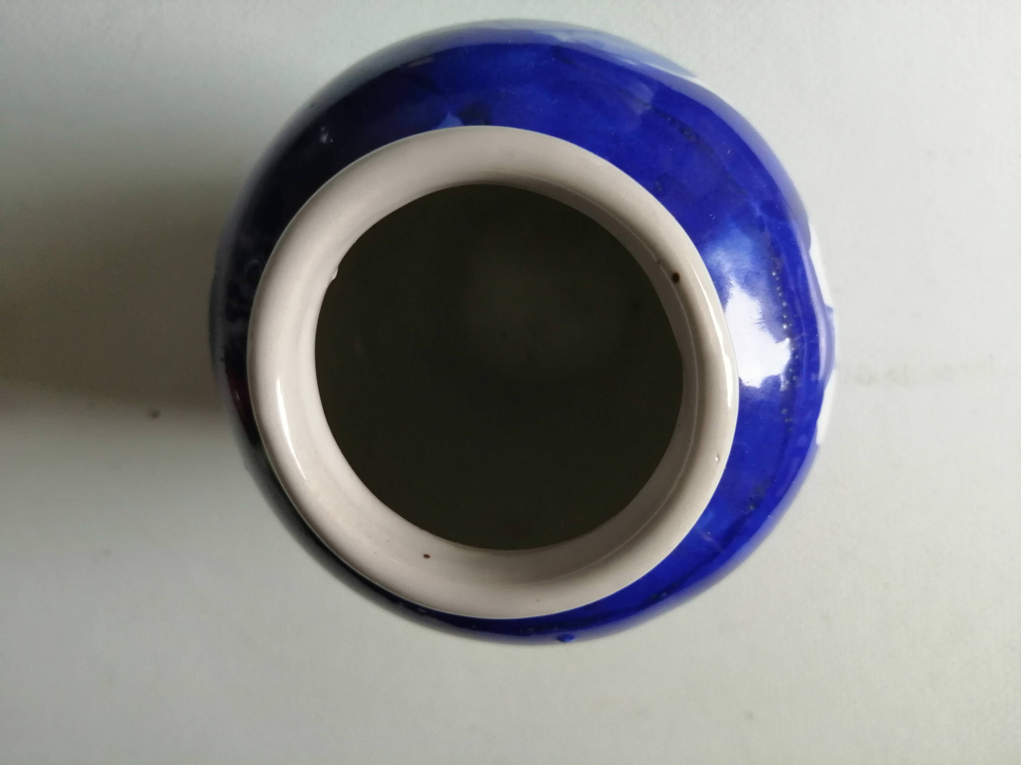 old vase in white and blue ceramics