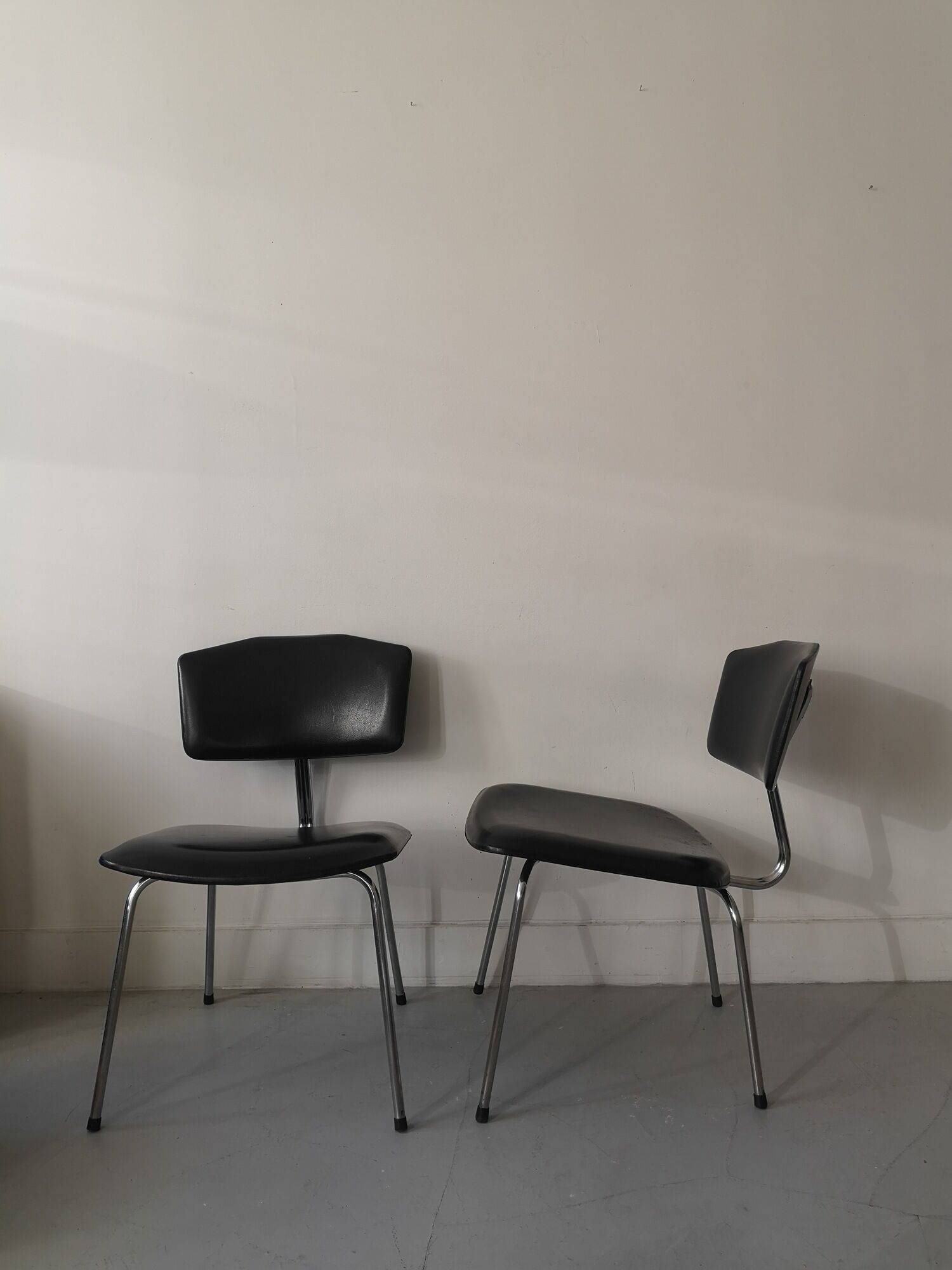 Pair of heaters design in black skai leather and metal, 1970