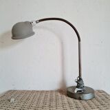 Antique articulated metal workshop lamp