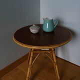 Round coffee table in wicker and bamboo