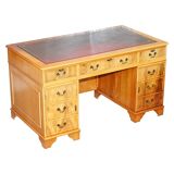Vintage satin wood partner desk with leather top.