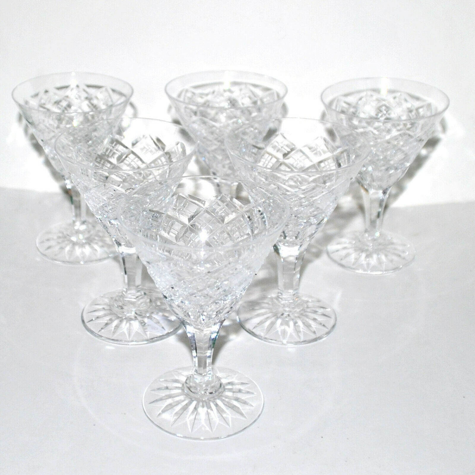 Series of 6 glasses with port on conical stand in cut crystal