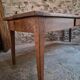 18th-century French farmhouse dining table in oak and chestnut.