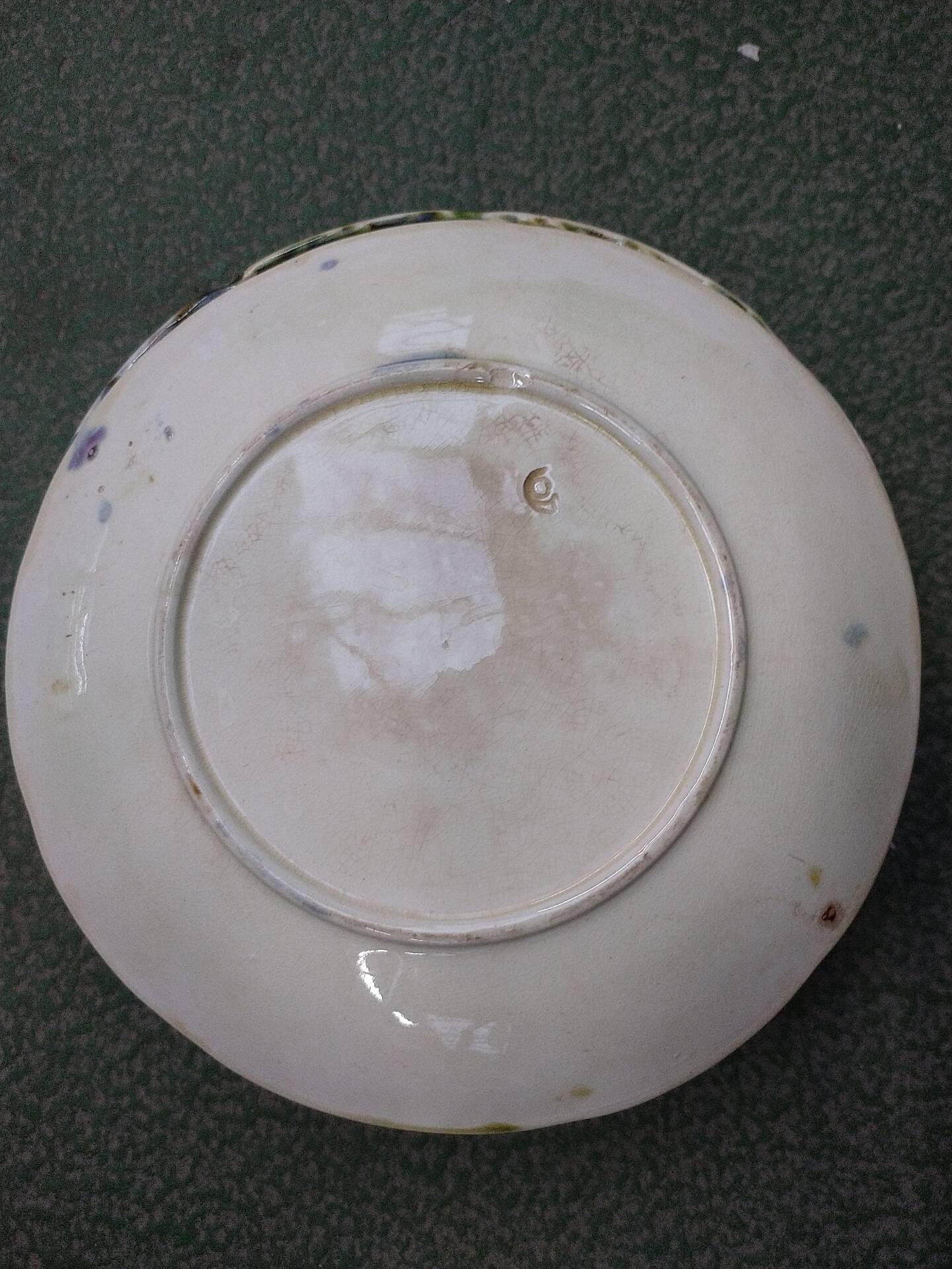 Slipware plates with vine decoration.