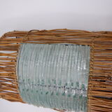 Glass and rattan sconce