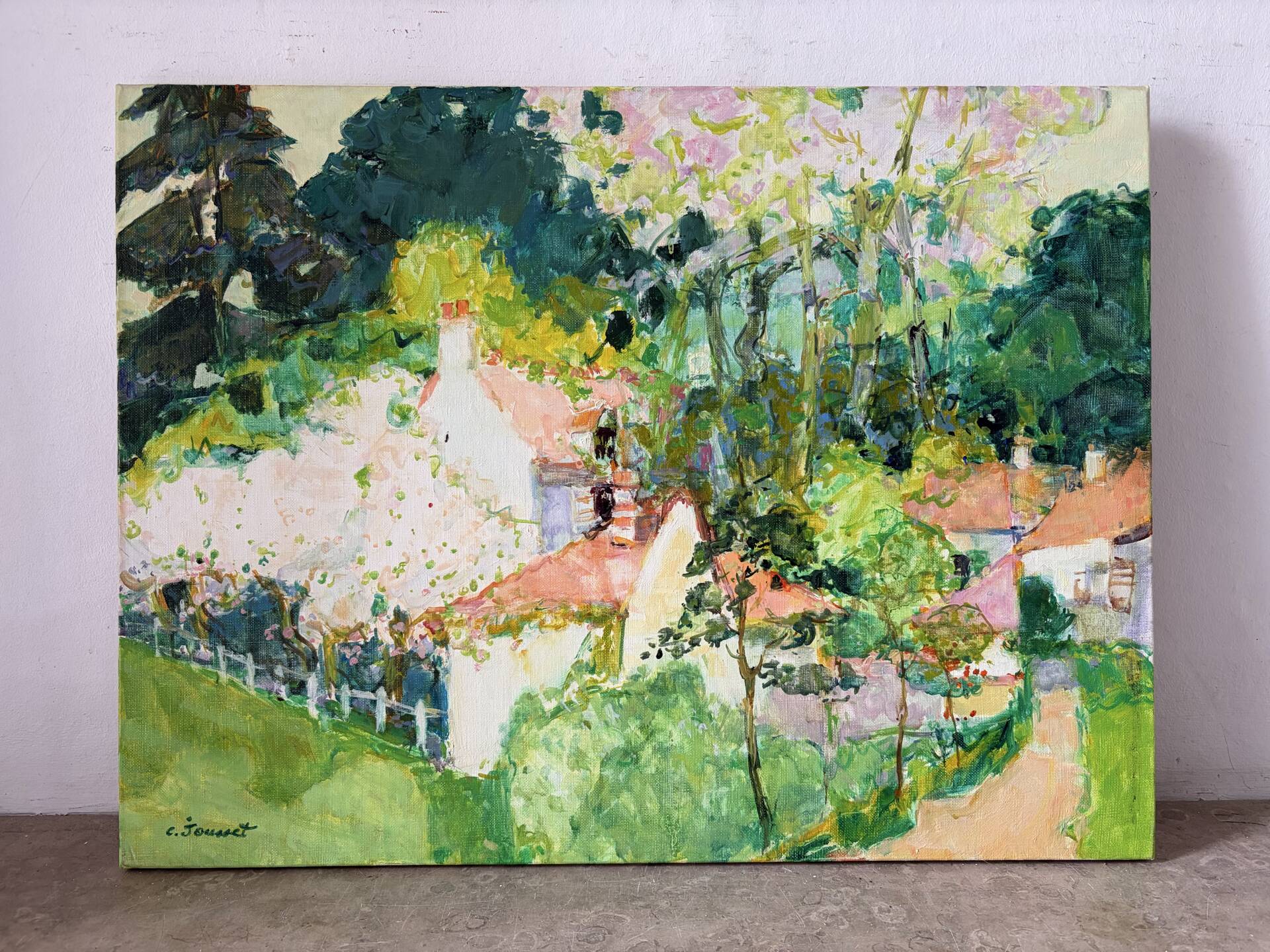 Village with pink roofs, oil on canvas signed Claude Jousset.